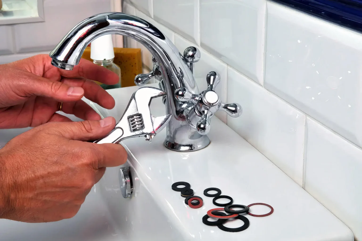 Plumber maintaining a bathroom faucet in Redondo Beach