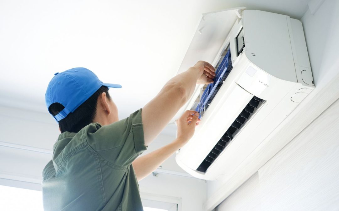 HVAC technician servicing a ductless mini split in Redondo Beach